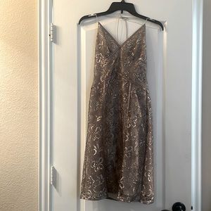 Express, silver backless dress for a fancy evening out.